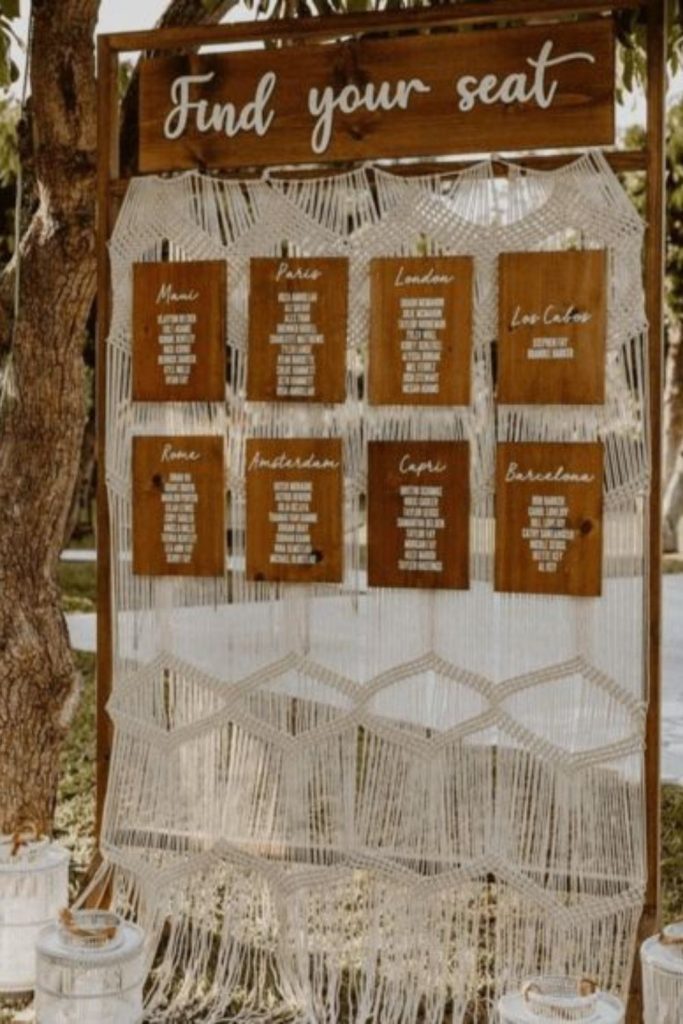 Macrame boho hanging seating chart woven design.