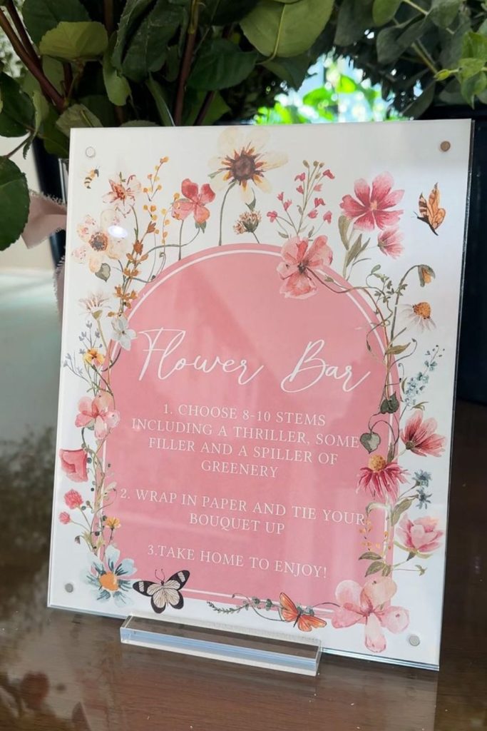 Vibrant hibiscus blooms on weathered timber