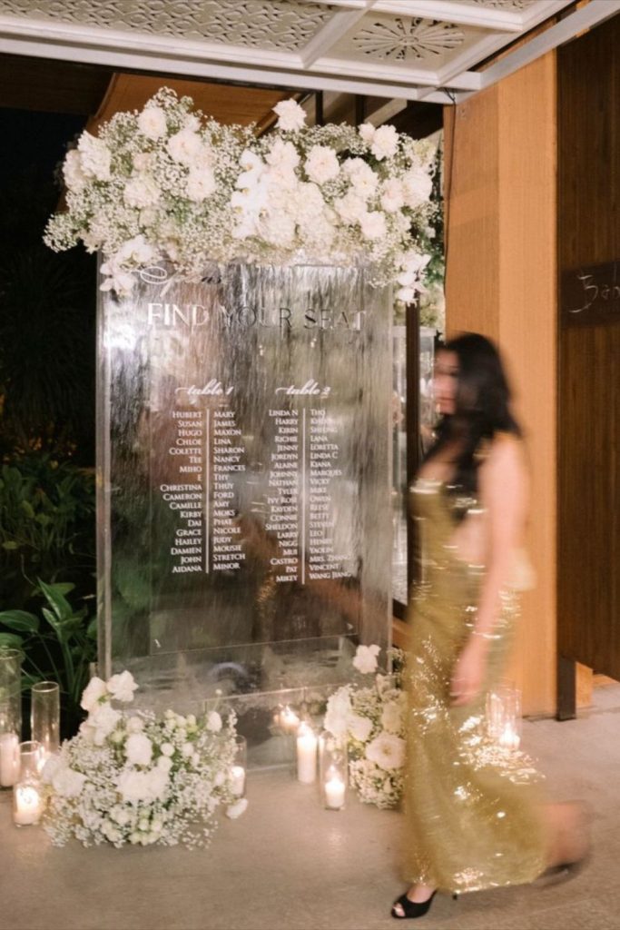 Ice sculpture elegant wedding seating chart display.