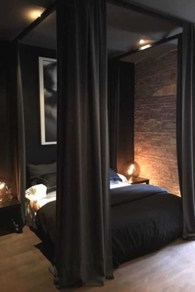 Geometric black canopy bed modern cube design.