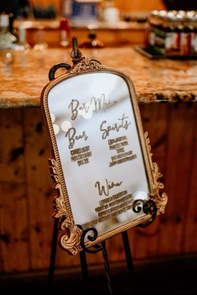 Mirror reflection script wedding bar display
