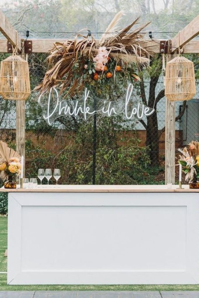 Neon cocktail sign modern wedding decor