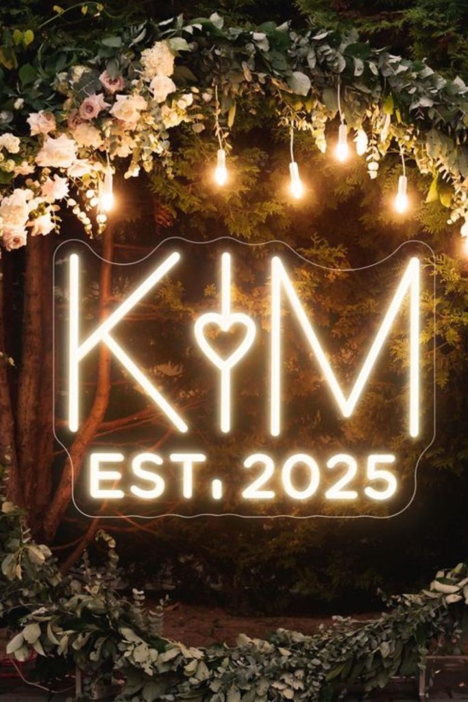 Vibrant neon letters glowing in darkness.