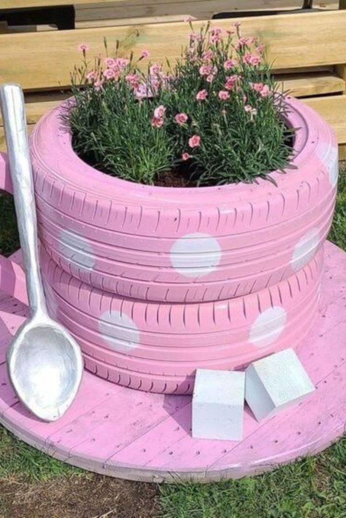 Painted tire flower garden planter art