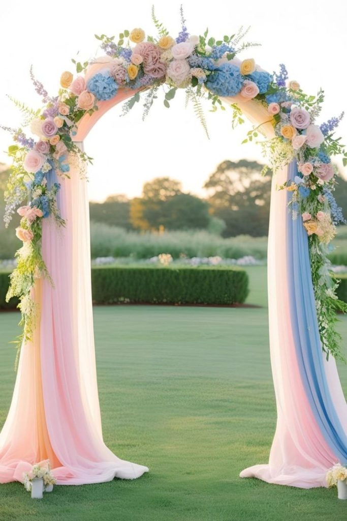 Rainbow pastel flowers forming welcoming arch.