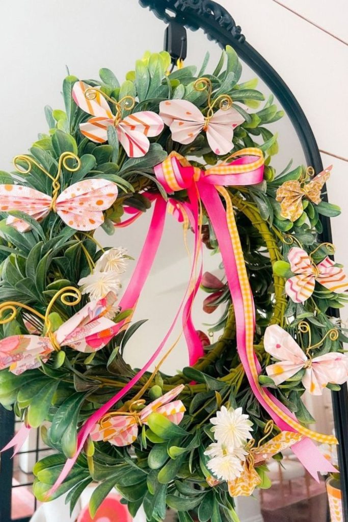 Spiraling paper petals with butterfly accents