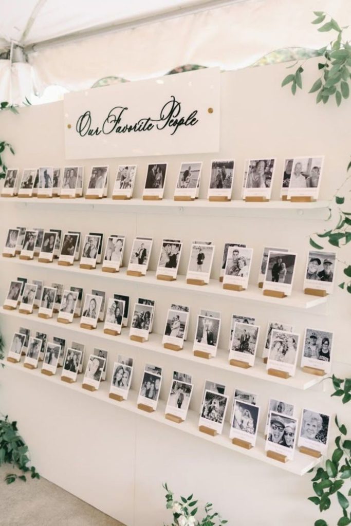 Polaroid photo wall personalized seating chart display.