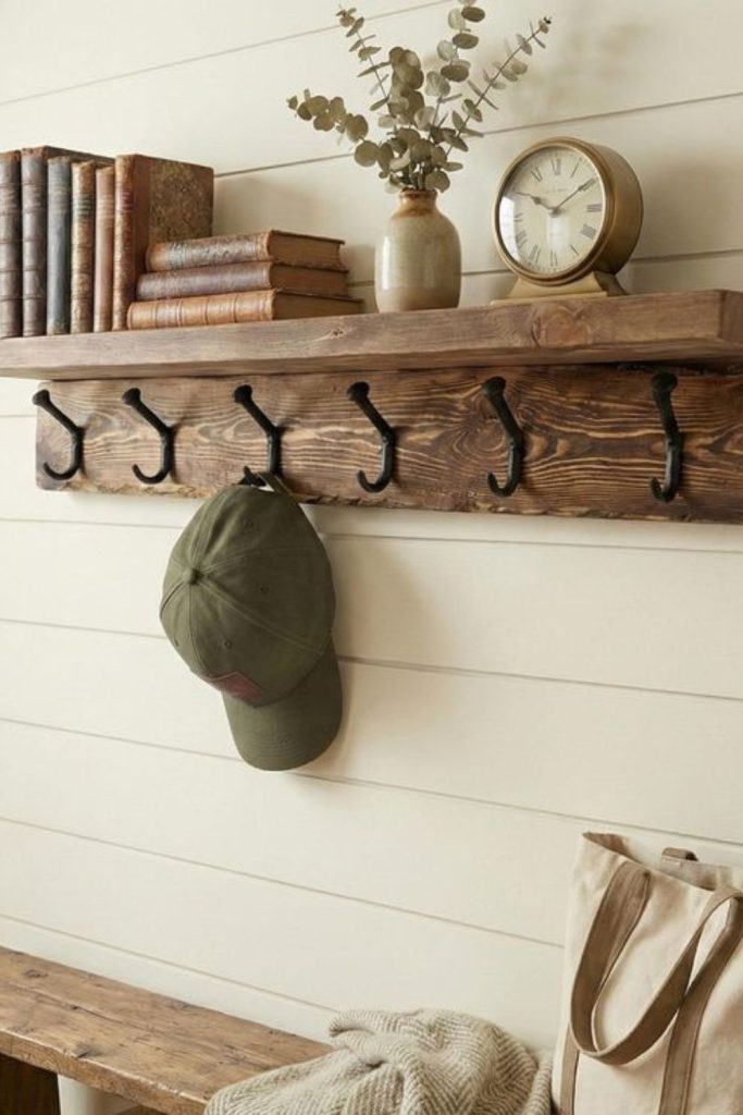 Wooden shelf with hooks for storage