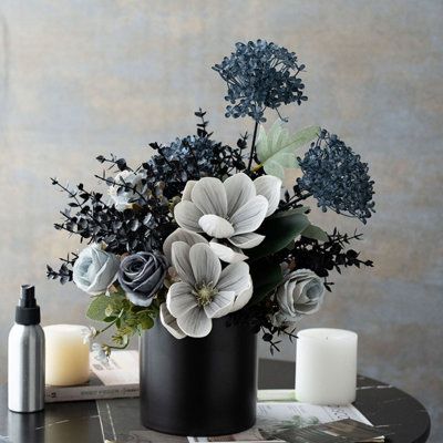 Charcoal-gray hydrangeas with misty-blue roses