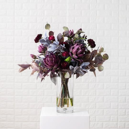 Deep purple dahlias with gray leaves