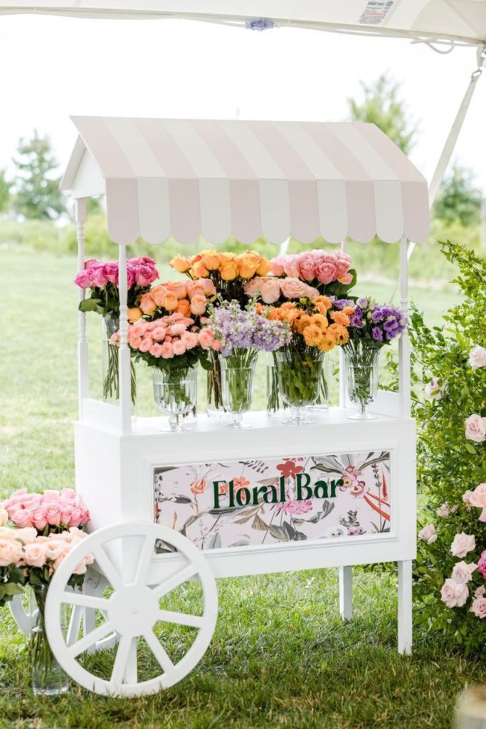 Indigo irises arching from cracked baskets