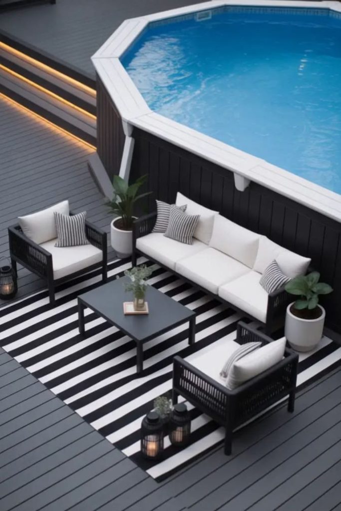 Black mirror pool, sleek reflective dramatic water surface.