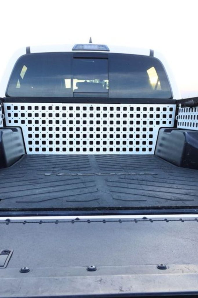 Cargo net divider wall truck storage system