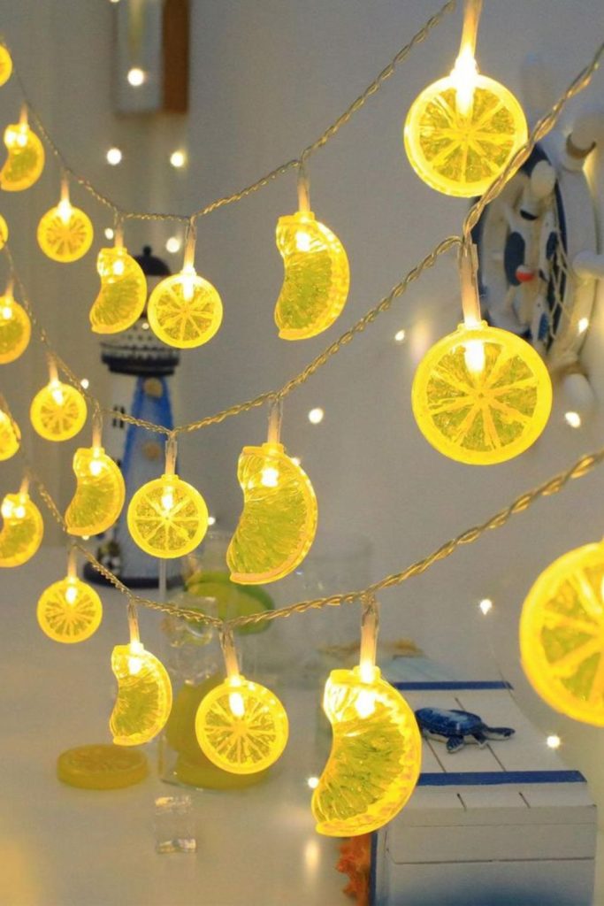 LED lighting strips creating warm citrus kitchen glow