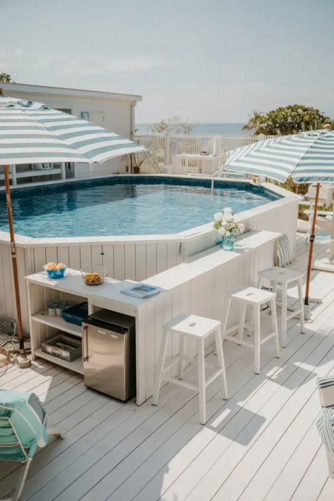 Driftwood coastal pool, breezy beach inspired outdoor escape.