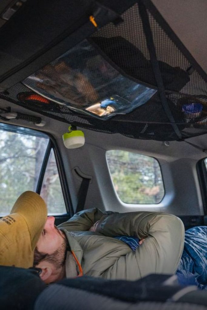 Elastic hammock net cargo bed storage system