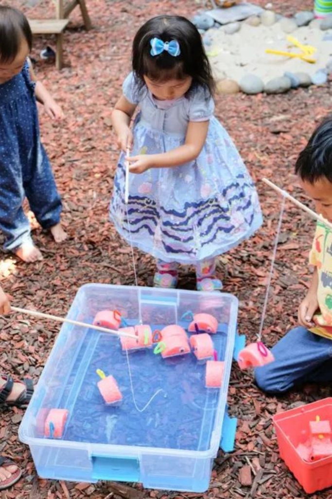 Fishing game pool kids outdoor play activity.