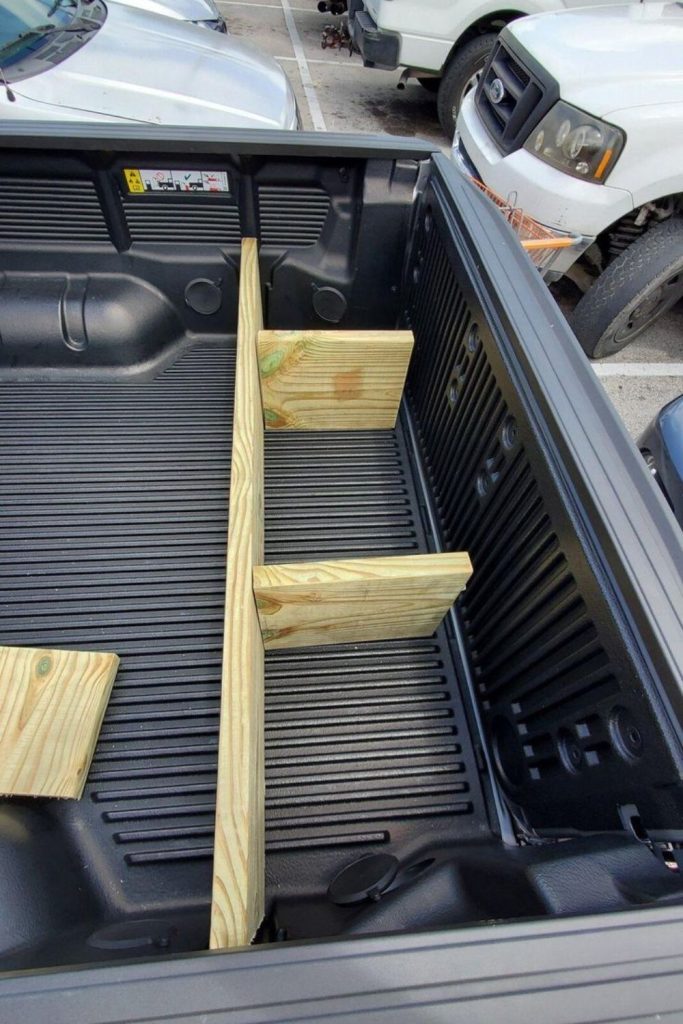 Wooden divider panels for truck bed organization