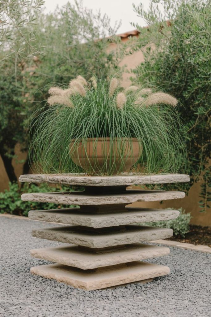 Pebble stone textured garden planter column