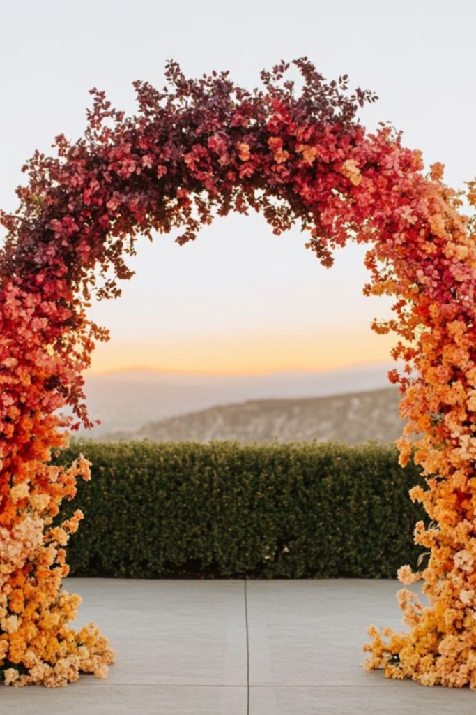 Floral arch sunset feast celebration