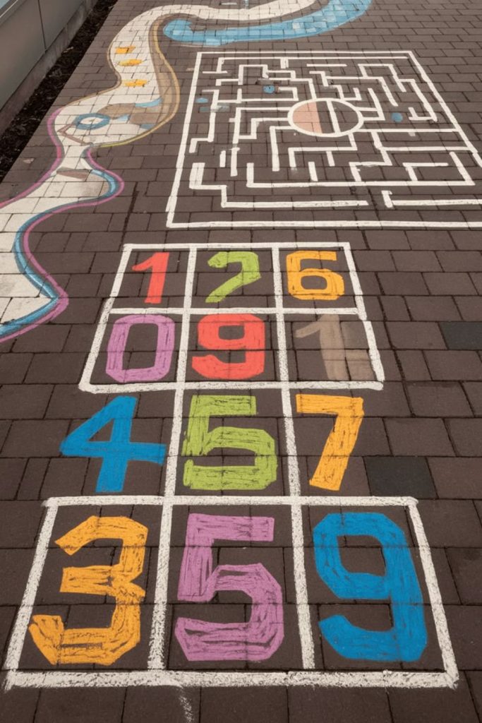 Chalk art courtyard kids creative drawing space.