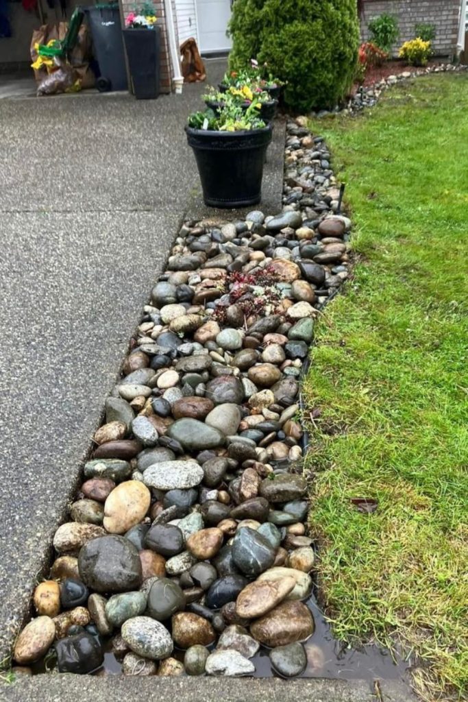 Gravel trench border yard drainage edge