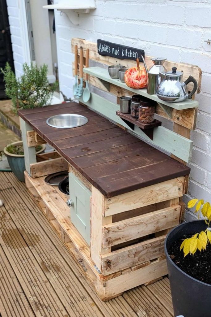 Log slice prep mud kitchen area