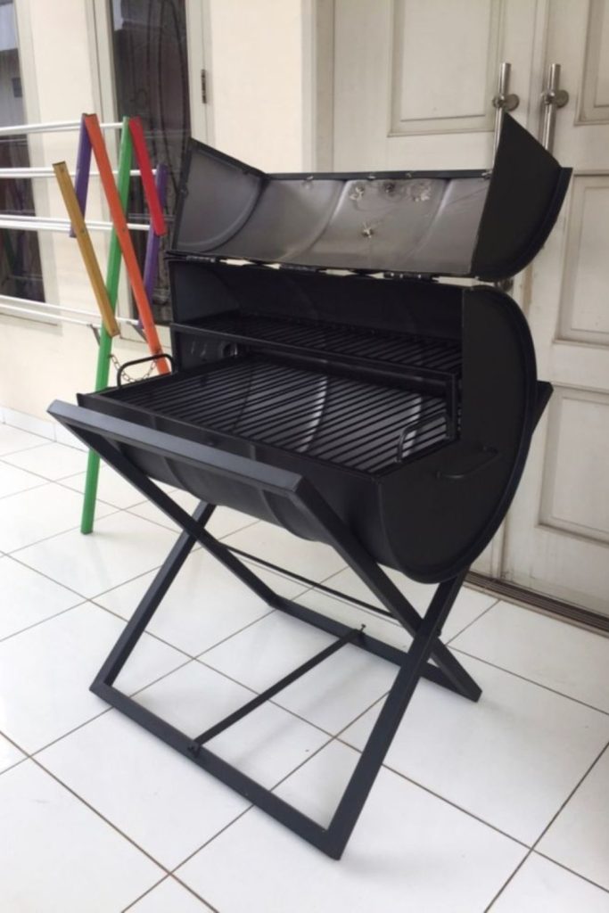 Metal drum DIY backyard grill station.