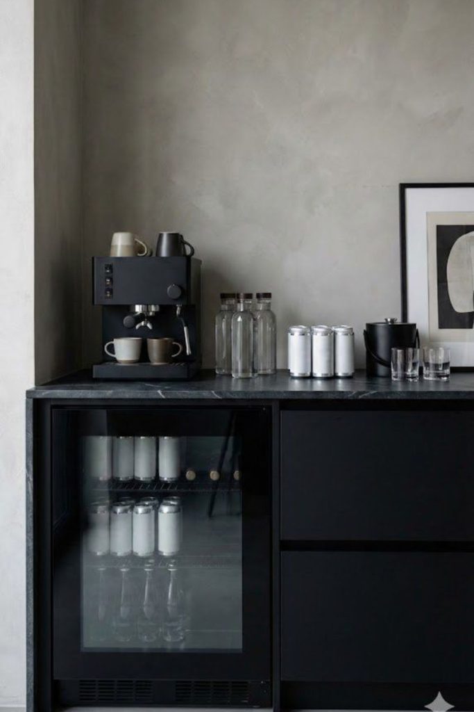 Monochrome black sleek modern coffee bar design.