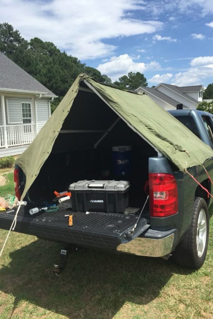 Suspended cargo net overhead truck bed organizer