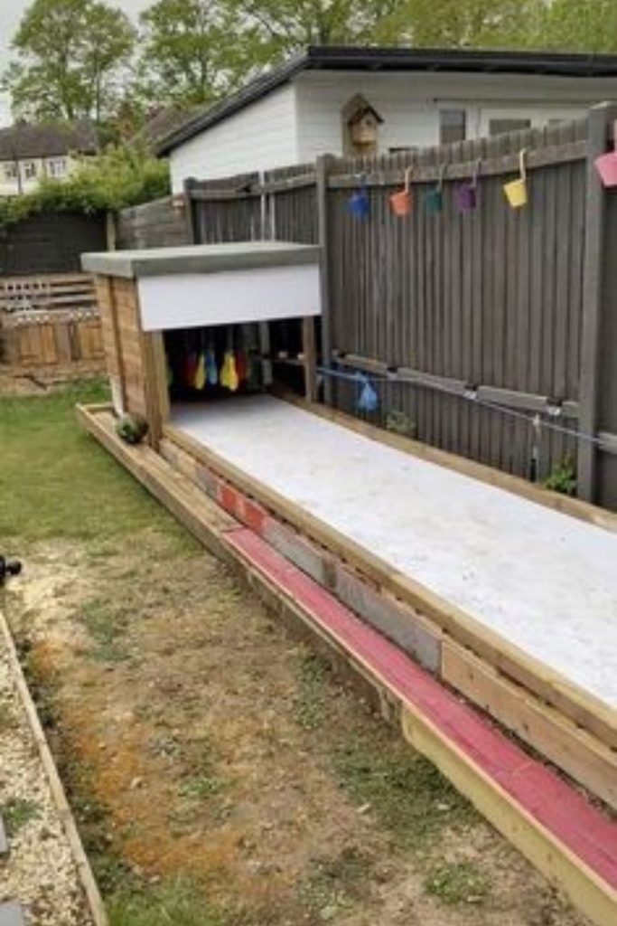 Bottle bowling tunnel recycled kids play game.