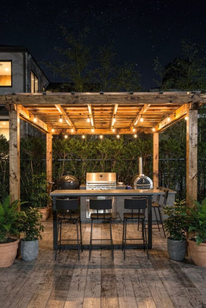 Rope light BBQ glowing outdoor path.