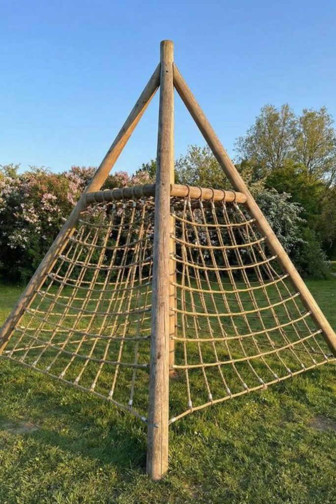 Rope web climbing structure for kids yard.
