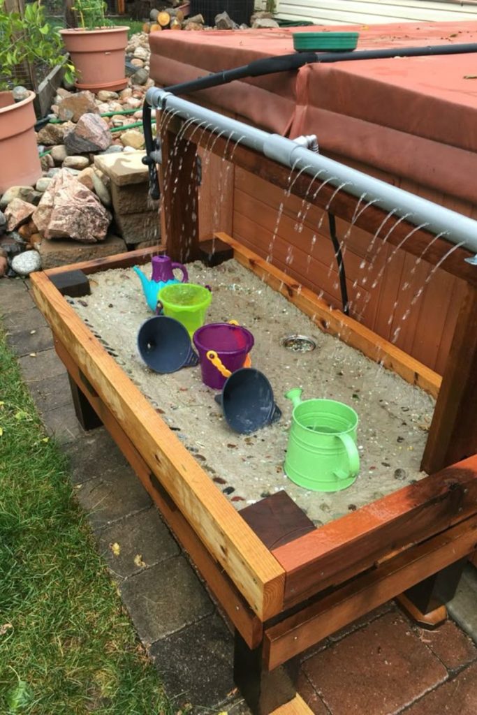 Sand and water sensory play station.