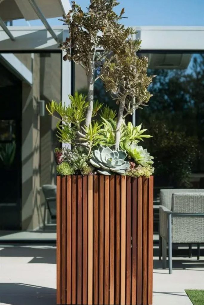 Slim cedar column garden planter design