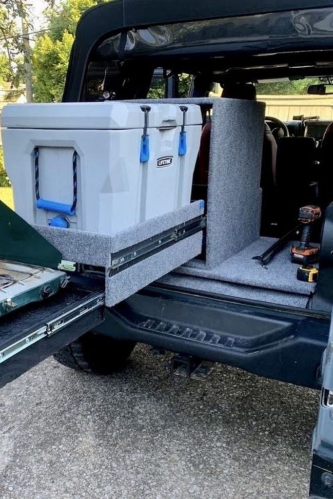 Sliding cooler drawer for truck bed storage