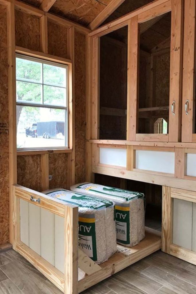 Sliding drawer style chicken coop shelving system