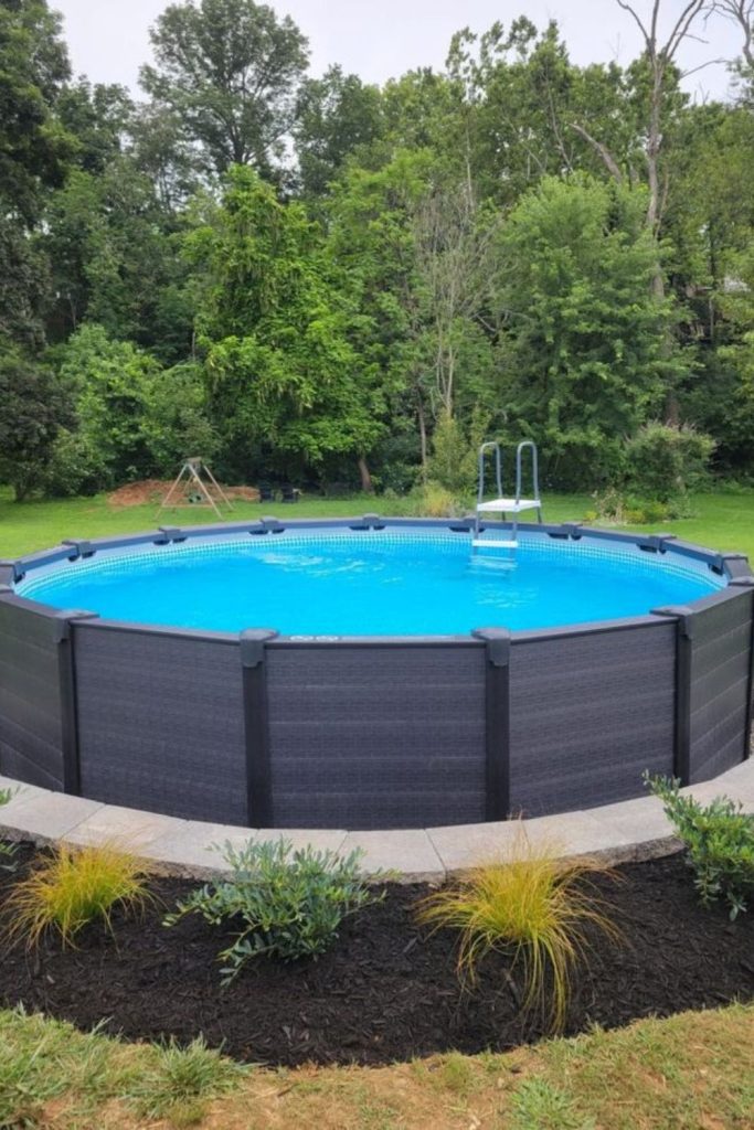 Minimal steel edge pool, modern clean reflective surface.