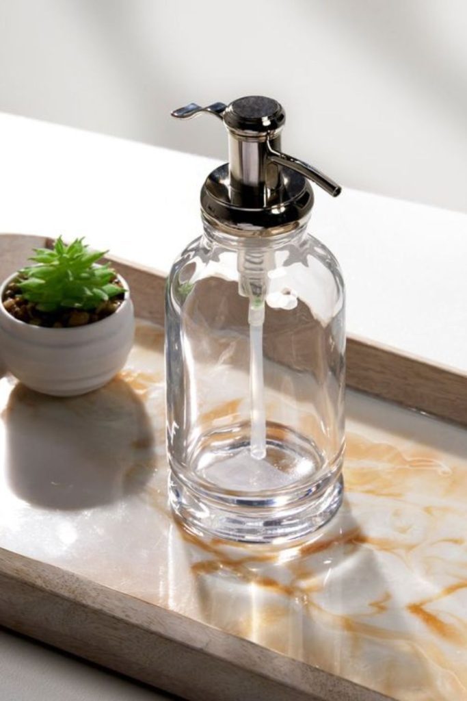 Transparent orb floating soap dispenser