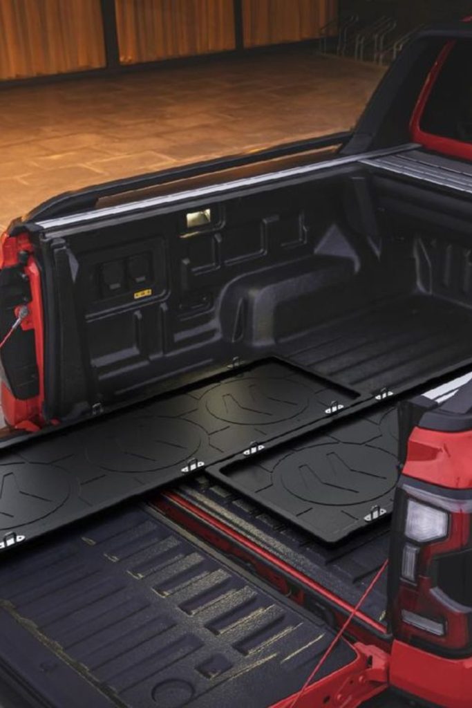 Wheel arch integrated compact storage pod boxes