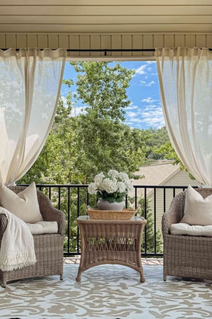 Linen draped pergola patio retreat.