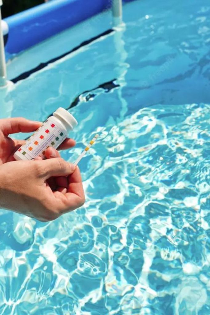 Pool chlorine test strip dispenser