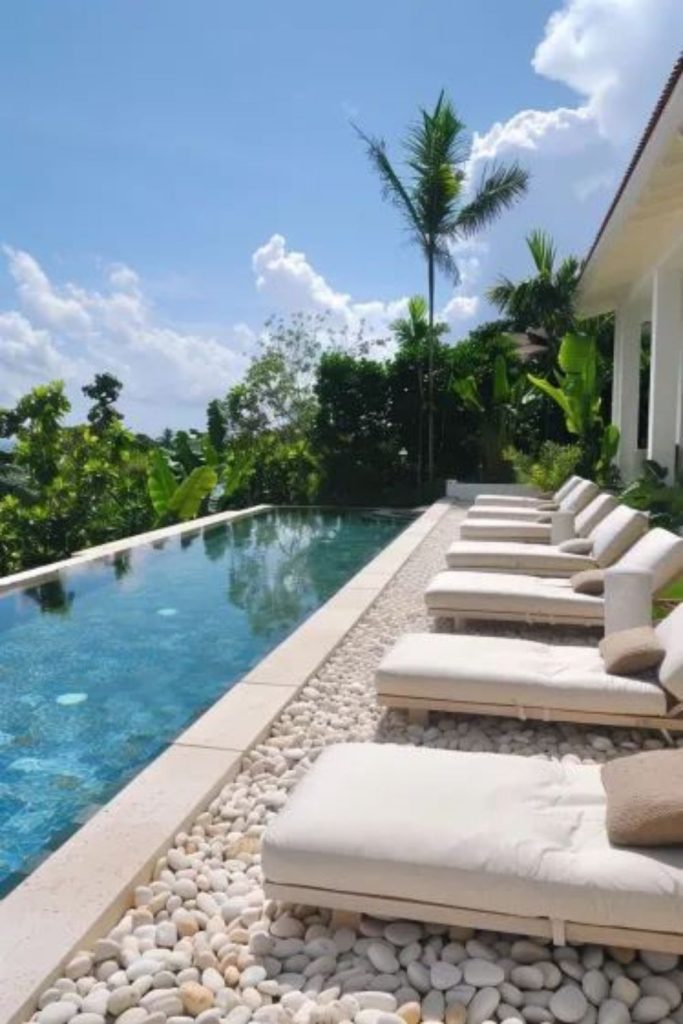 Coastal pebble shoreline pool deck
