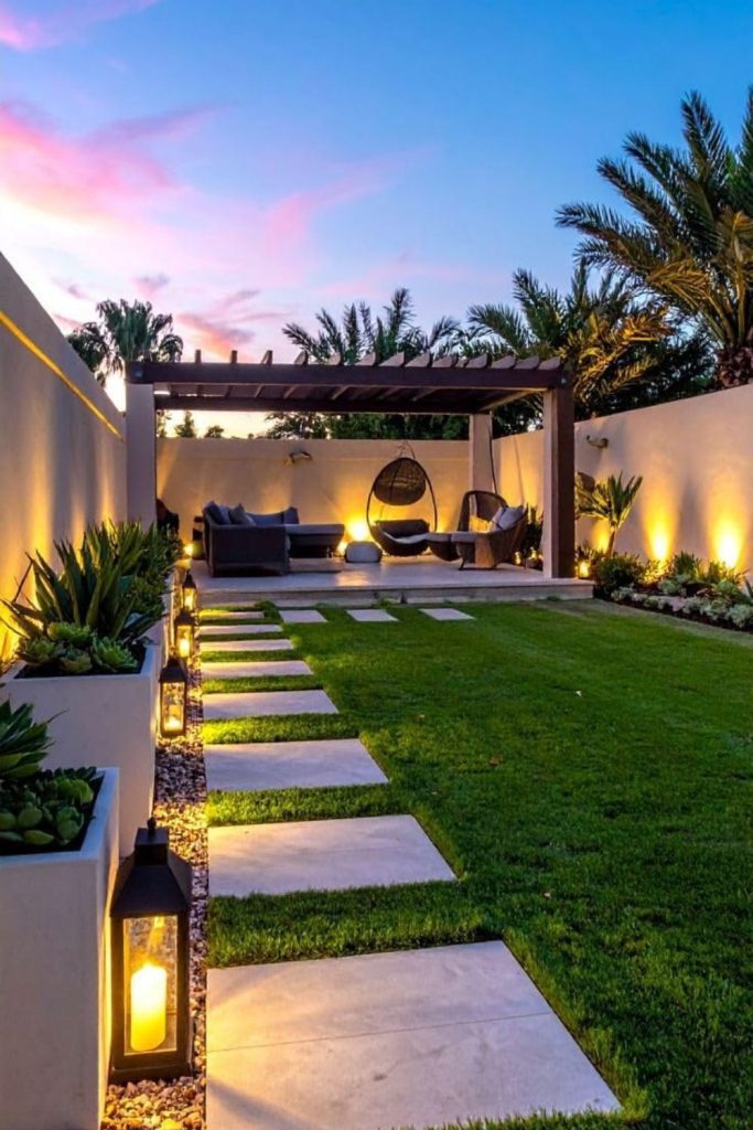Courtyard concrete patio glowing softly.