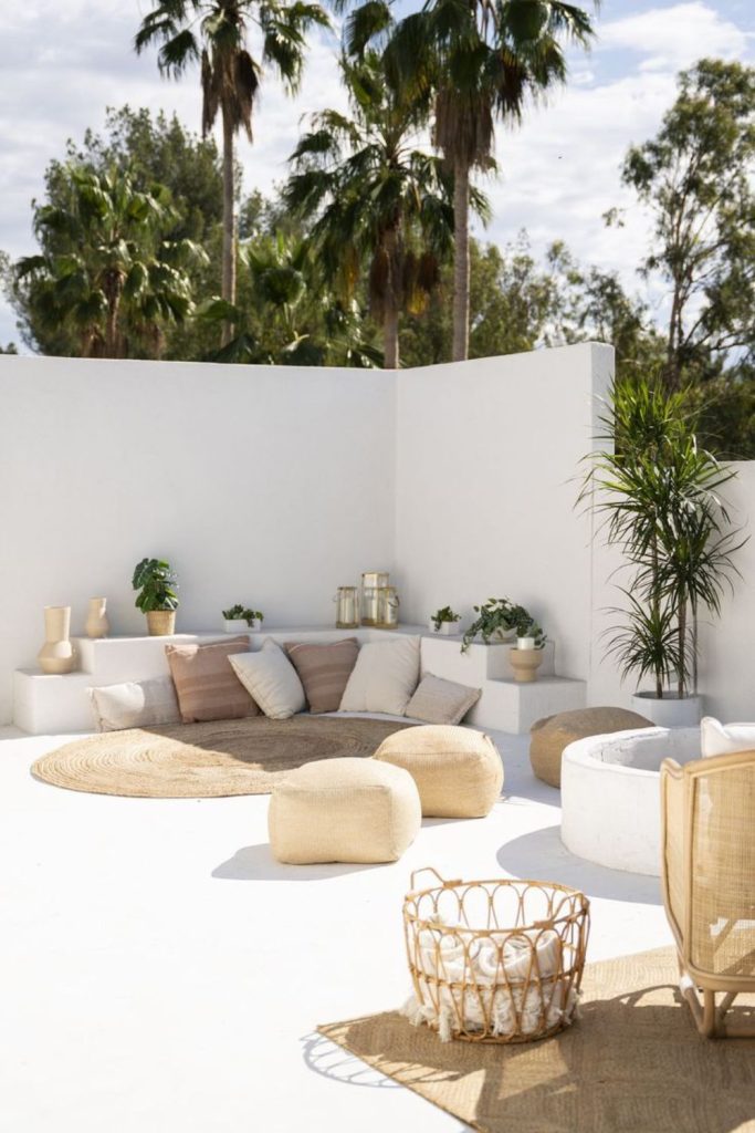 Desert-style concrete patio with cactus.