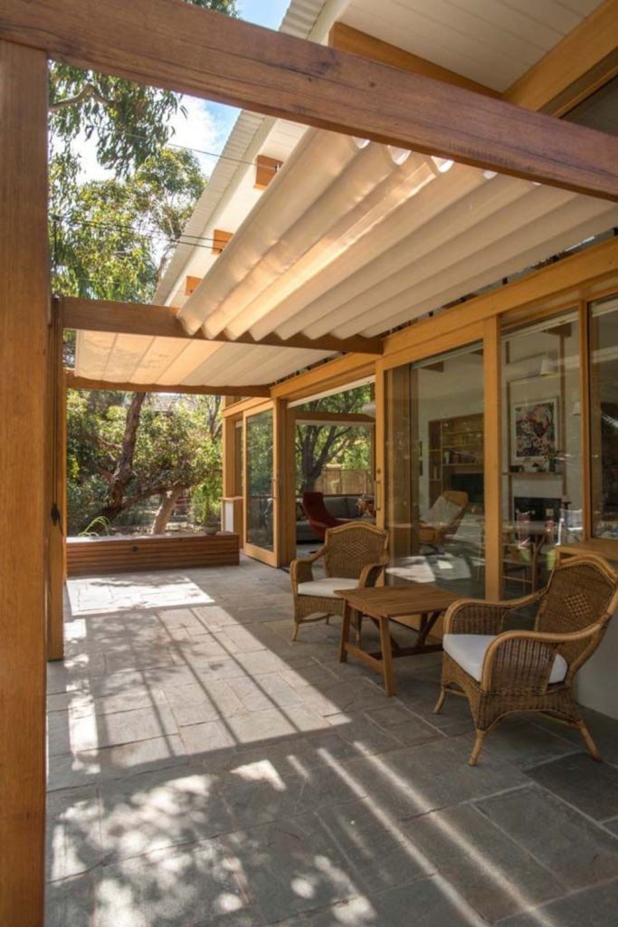Oak pergola glowing during sunset.
