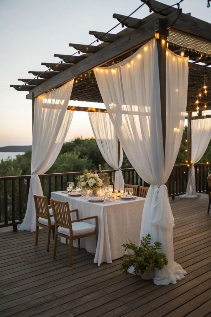 Pergola patio with flowing curtains.