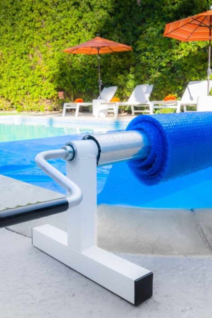 Pool cover roll alignment cradle