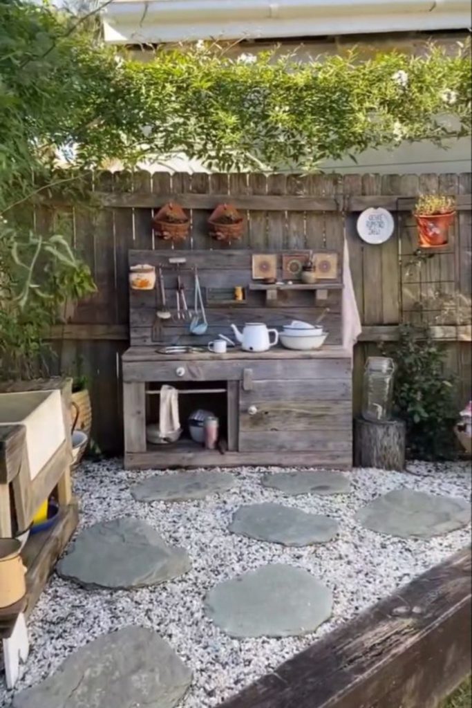 River rock backyard mud kitchen.