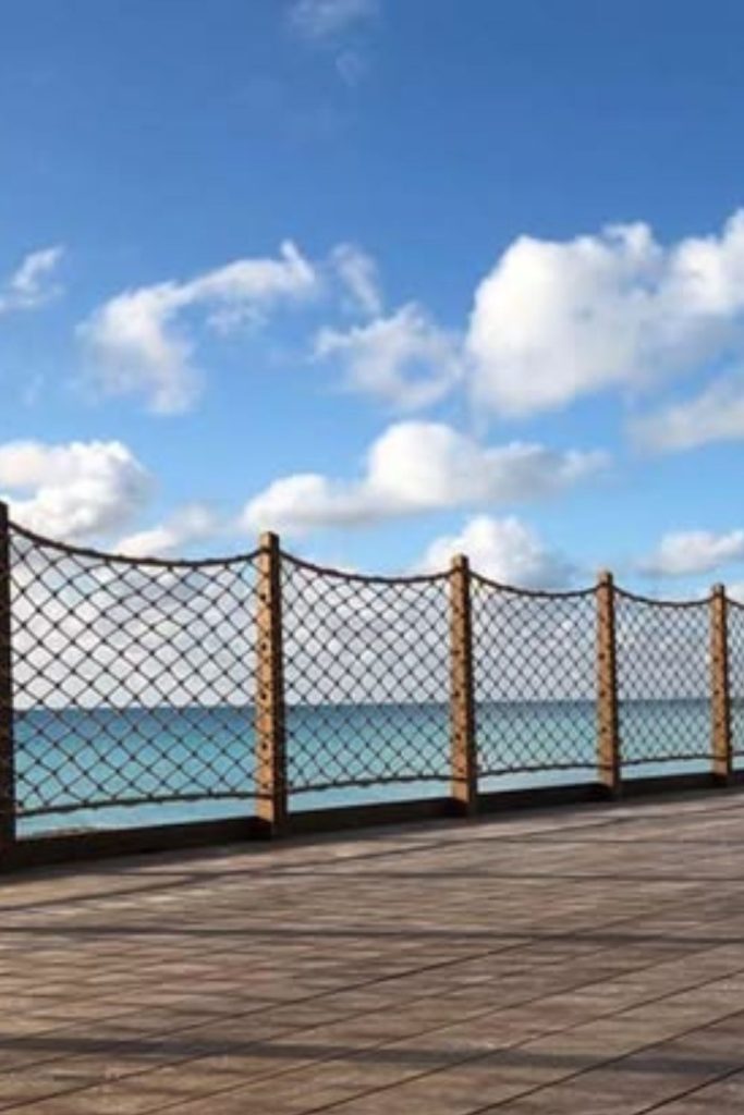 Suspended rope net poolside walkway design